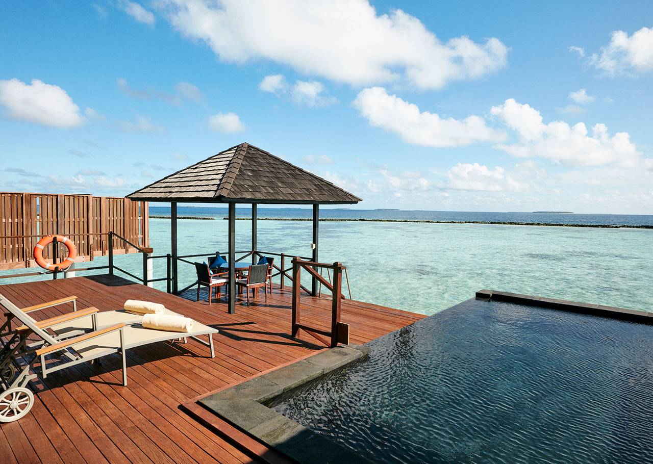 overwater villa with infinity pool