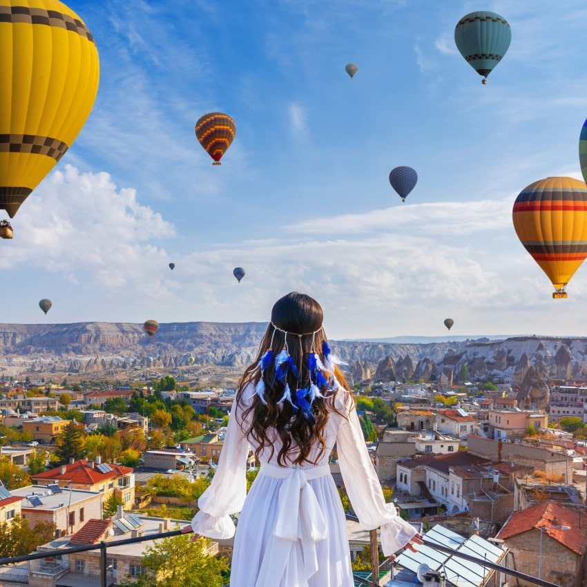 Beautiful girl standing in Cappadocia, Turkey.