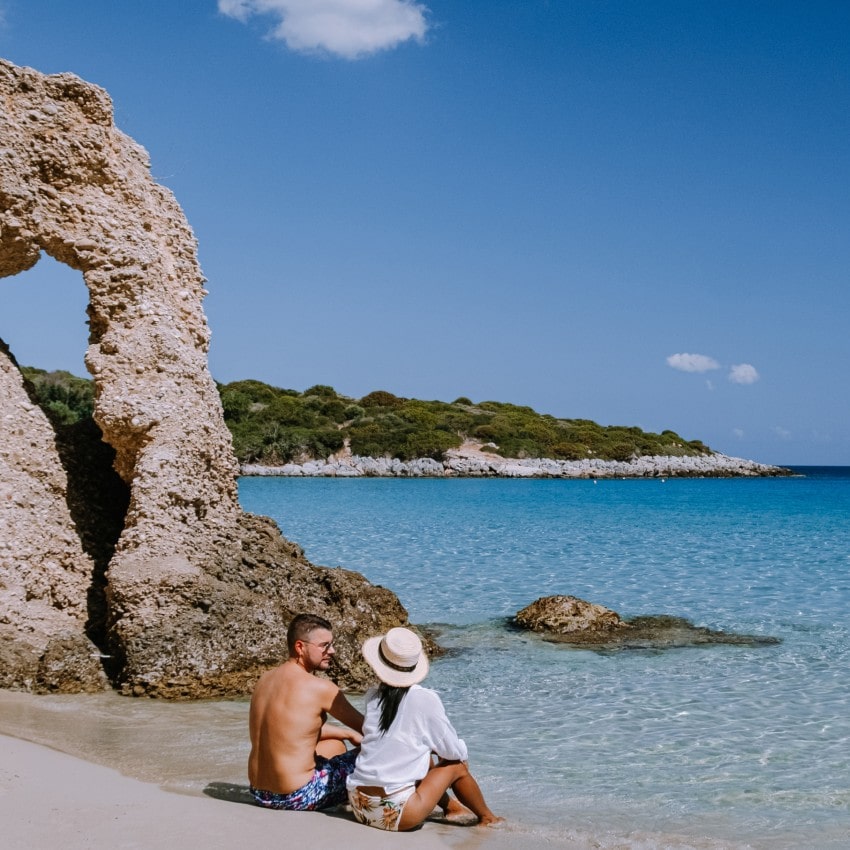 Couple on Voulisma beach, Greek Islands