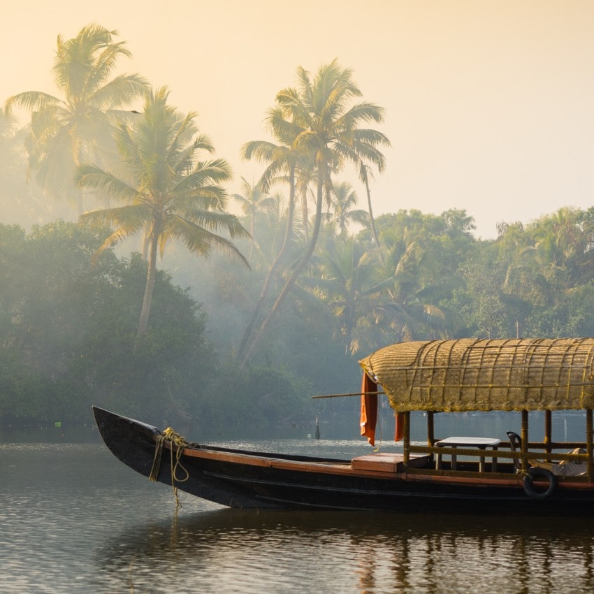 A traditional house boat in Kerala's Backwaters, India