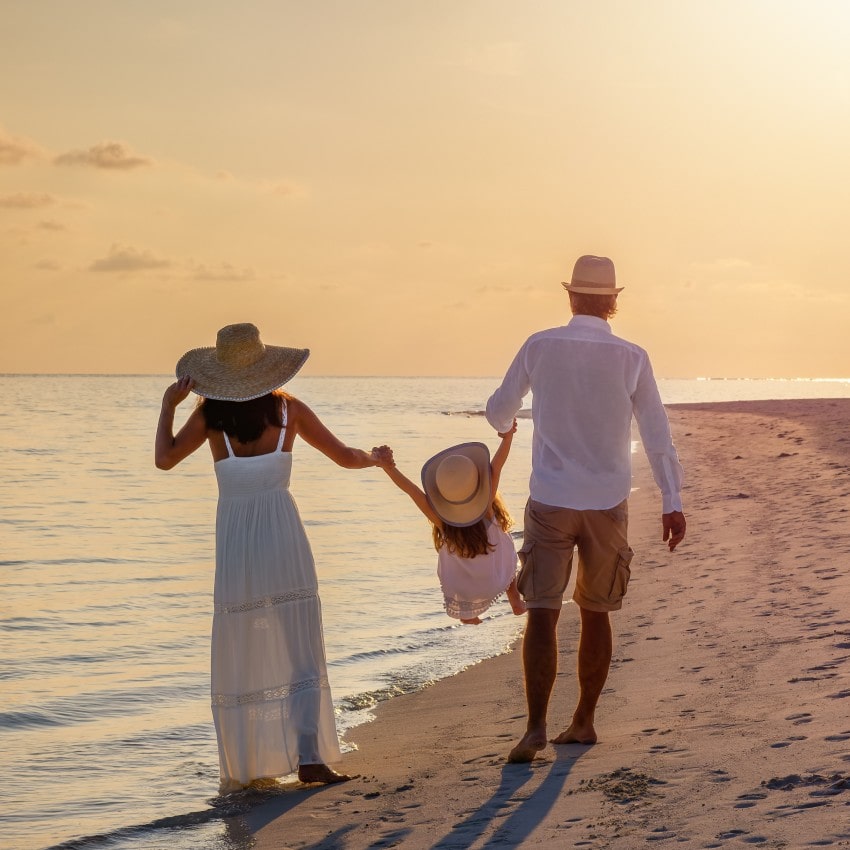 Maldives family on the beach