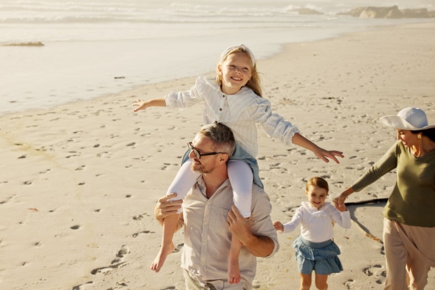 Family on beach in Australia for a holiday