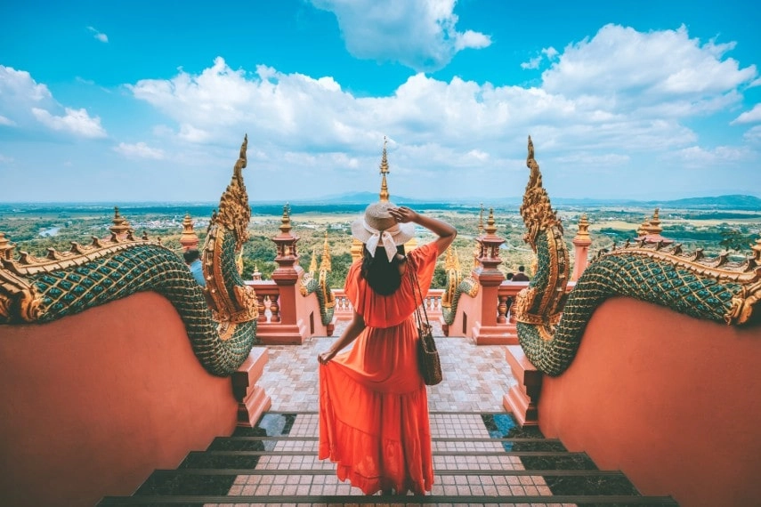 Asian woman with dress travel in temple