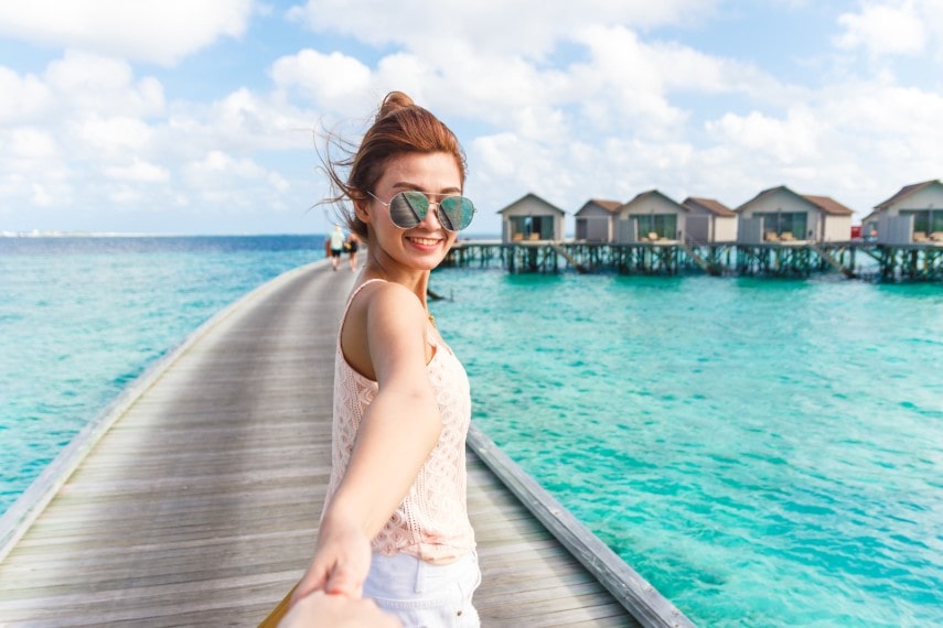 Woman wear breathable outfit in Maldives in October