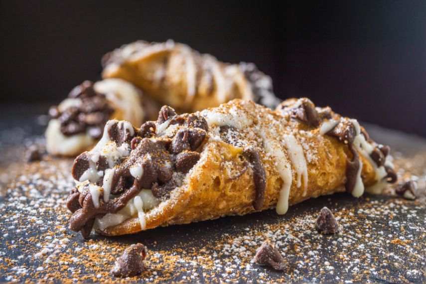 Eat Cannoli pastry with white and dark chocolate in Boston, USA