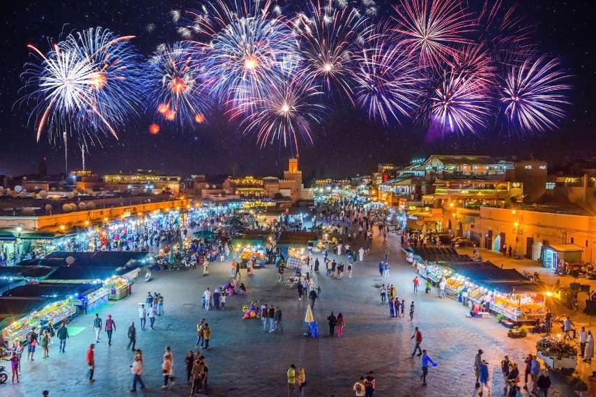 Visit at Jamaa el Fna market square with fireworks, Marrakesh, Morocco