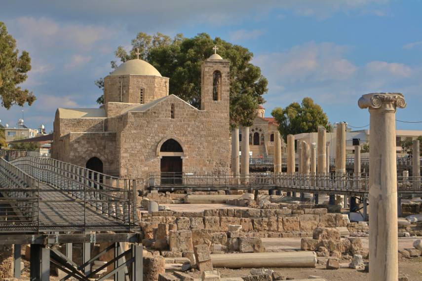 Panagia Chrysopolitissa Church surrounded by ancient ruins and columns in Paphos, Cyprus