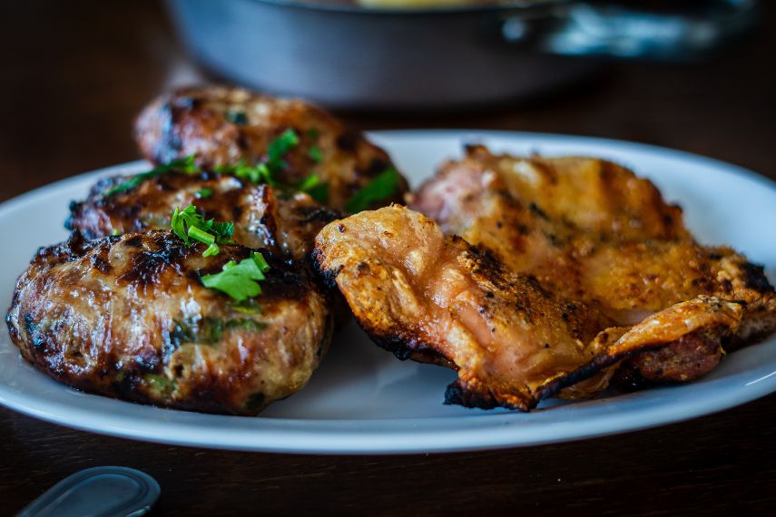 Sheftalia grilled on coal with grilled chicken Cyprus meze