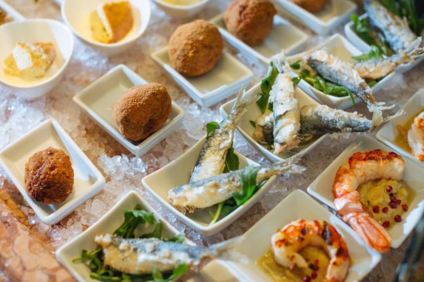 Eat Venetian cicchetti polpette, Sarde in Saor and shrimps with polenta