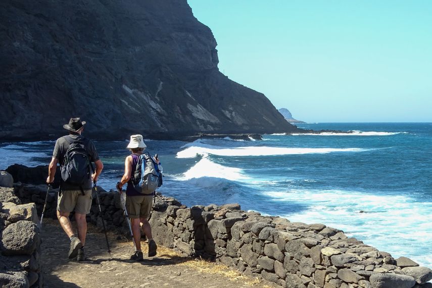 Strong couple walking along the atlantic ocean, Cape Verde islands, Santo Antao
