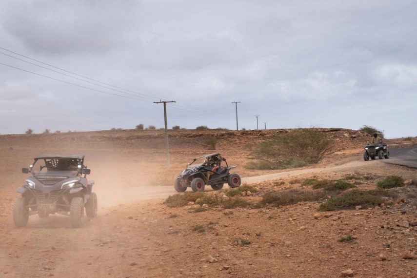 Three quads travel on a dirt track, Boa Vista