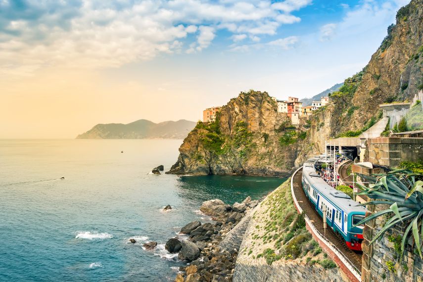 Manarola, Cinque Terre - train station in famous village with colorful houses on cliff over sea in Cinque Terre

