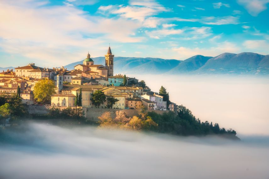 Trevi picturesque village in a foggy morning. Perugia, Umbria, Italy.
