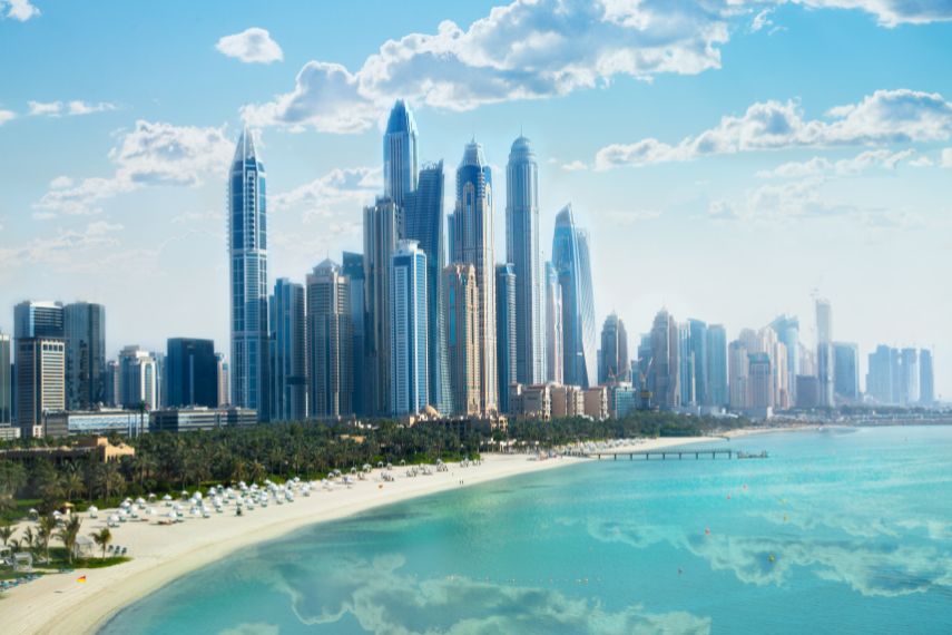 Dubai marina in the sunny day with front line of beach hotels