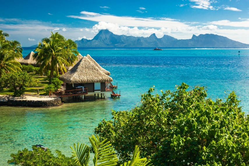 Overwater bungalows with best beach for snorkeling, Tahiti, French Polynesia