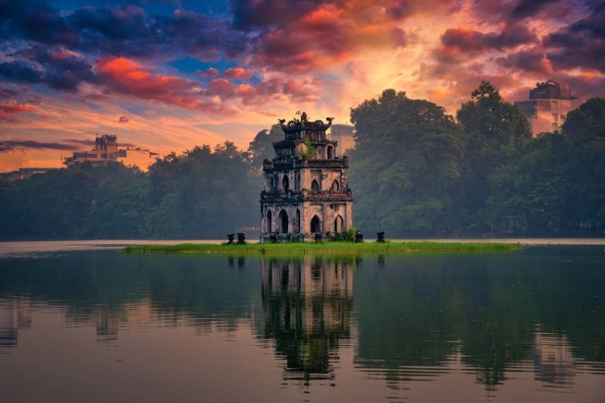 Turtle Tower on Hoan Kiem Lake at sunset in Hanoi