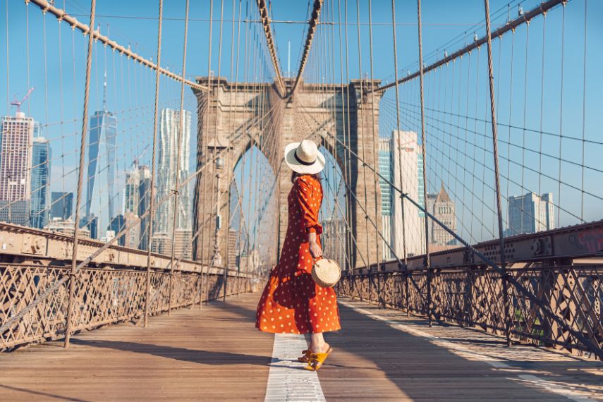 Young tourist on the Brooklyn Bridge in New York